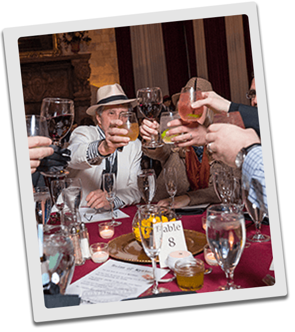 Table Doing a Cheers at a Murder Mystery Dinner in Sacramento