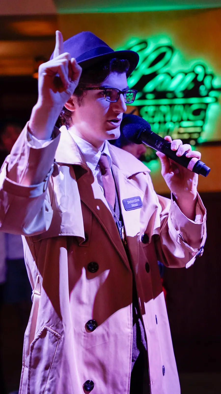A Murder Mystery Company actor working the room at a Sacramento show